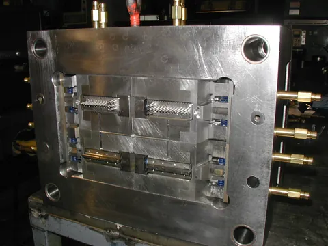 Multi-cavity mold with water line fittings